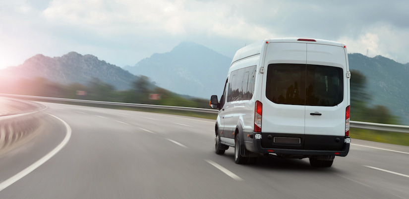 Van driving down the road